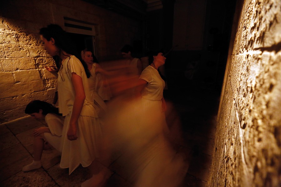 Annual Collective Performance of the School of Performing Arts. White White is a performance about space, or the absence of it. Once upon a time, characters were in search of an author. Today they are in search of a space. The characters, played by the students of the School of Performing Arts at the University of Malta, are lost in a corridor in-between places. Around them all is empty. A void. Like a vault, all they have isÖWhite! Photo: Darrin Zammit Lupi