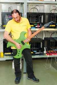 Etienne Camilleri showing off a 3D printed guitar